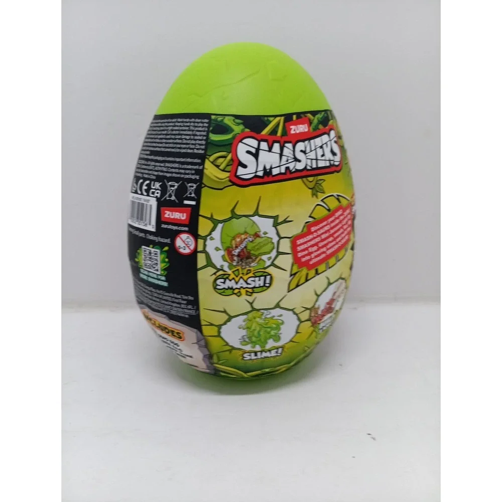Zuru Smashers Mini Jurassic Light Up Dino Green Bone 6 Surprises Slime Egg ~NWT